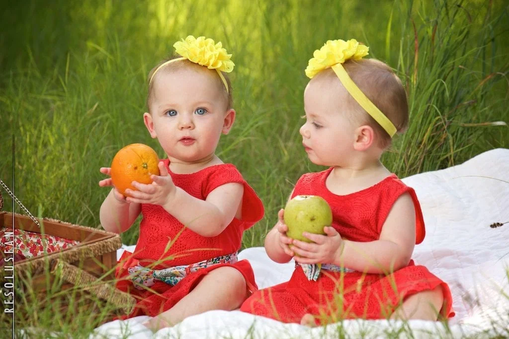 twin babies in park