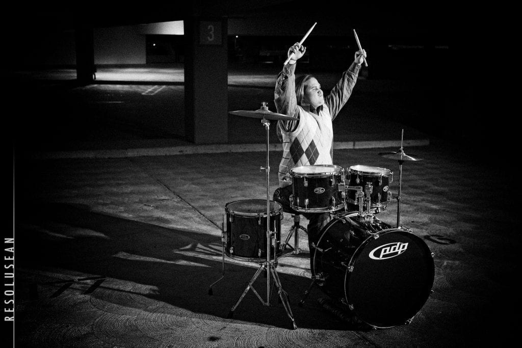 Teen Playing Drums