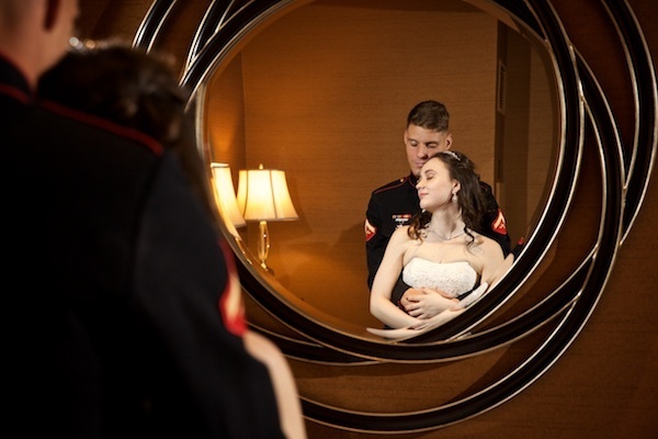 Photo of wedding couple in mirror