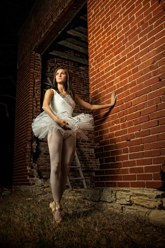 Dancer on pointe near old building