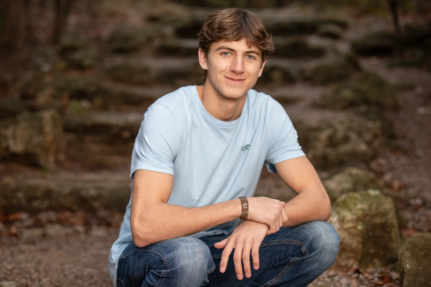 Senior photo high school boy in blue shirt