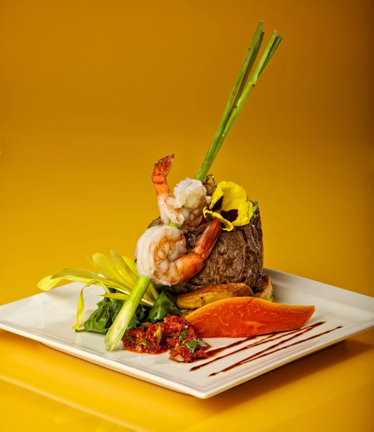 shrimp, steak and veggies with tropical flair