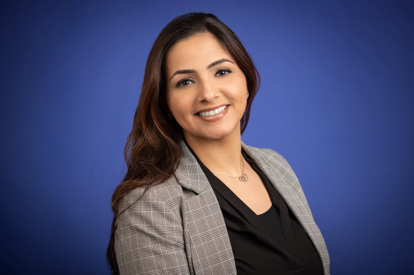 Female head shot on blue background
