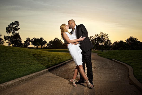 photo of bride and groom kissing